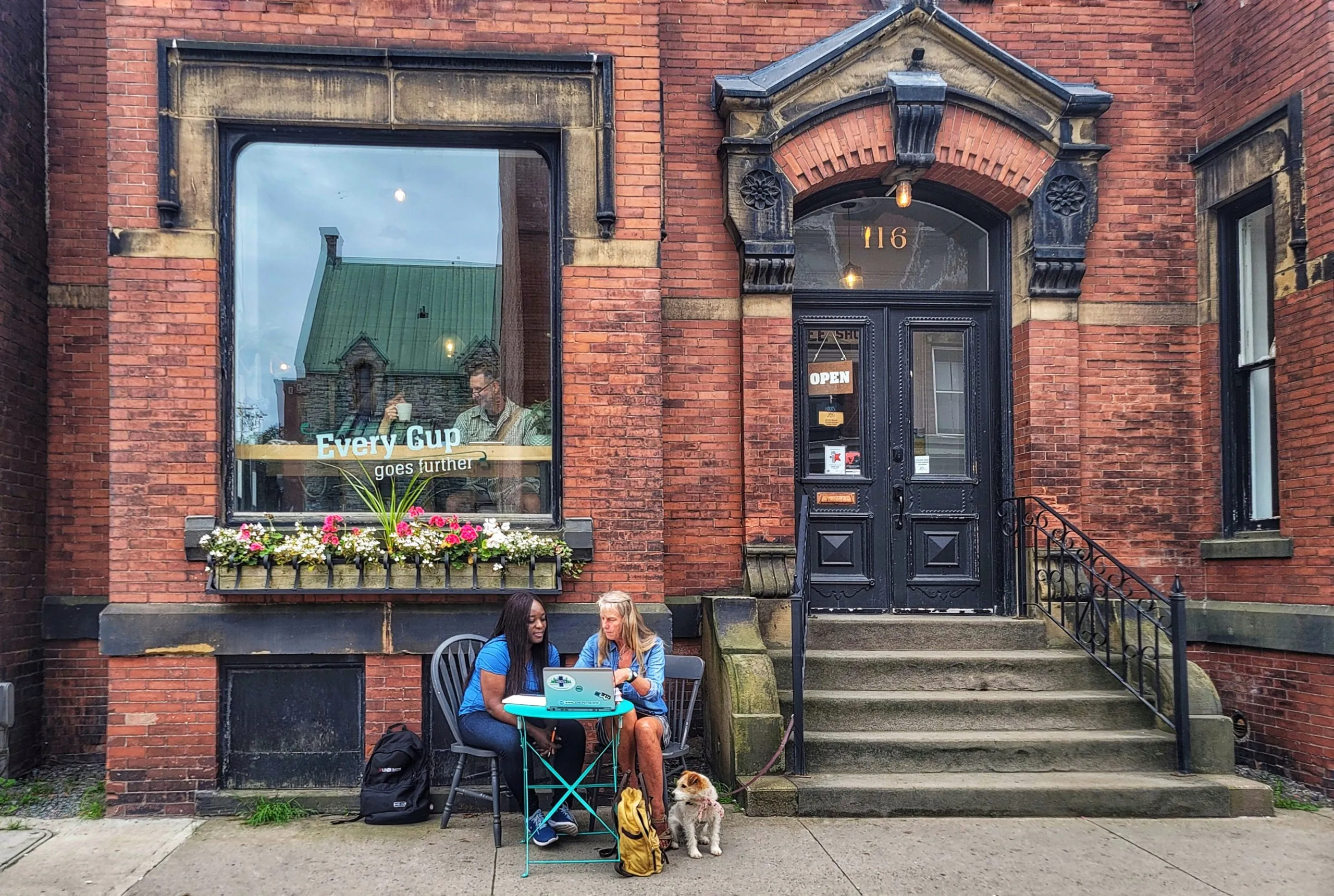 a sunflower in a field with a blue sky in the background